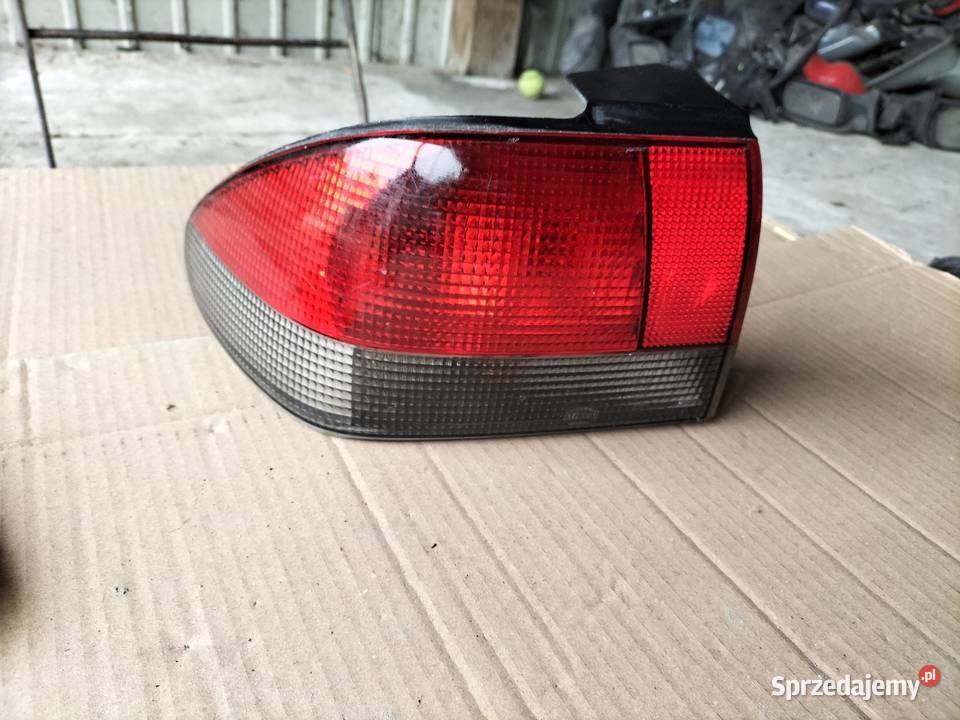 SAAB 900 LAMPA TYŁ TYLNA LEWA Kamień-Kolonia
