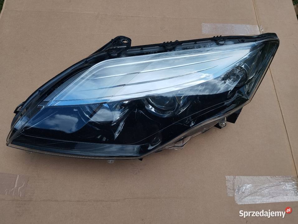 Laguna iii 3 lift lampa reflektor lewy oryginał Łask