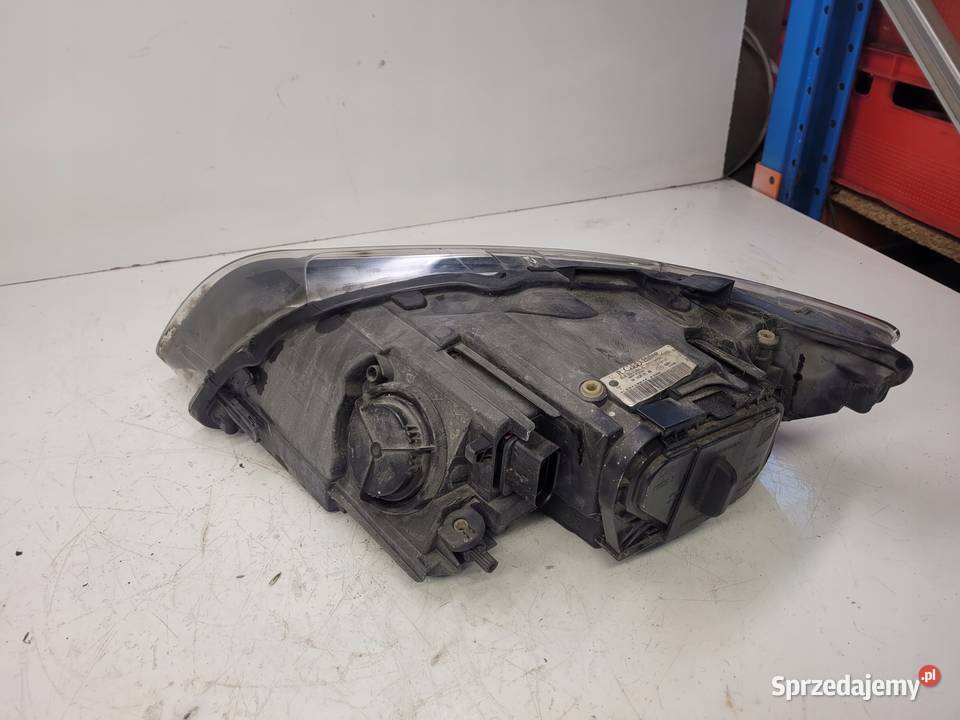 REFLEKTOR PRAWY ZWYKŁY AUDI Q7 4L 4L0941004K UK Przystajń