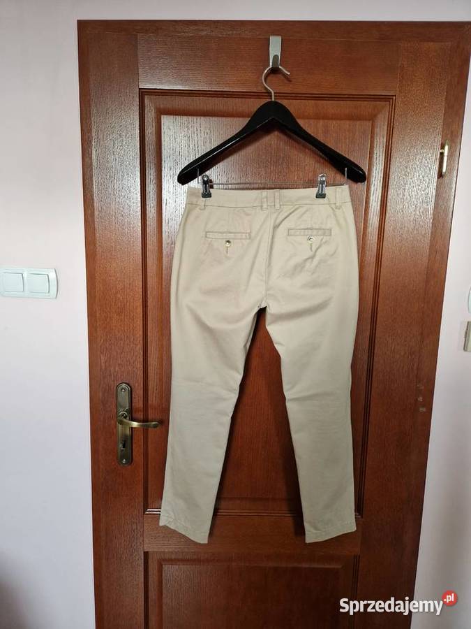 Nowe beżowe bawełniane spodnie damskie chinosy Moda i Styl Bibice