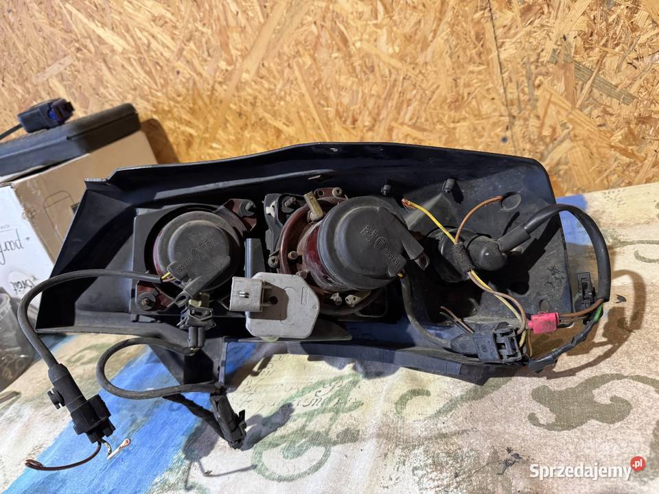 Opel Astra G lampy przednie projektory Hella