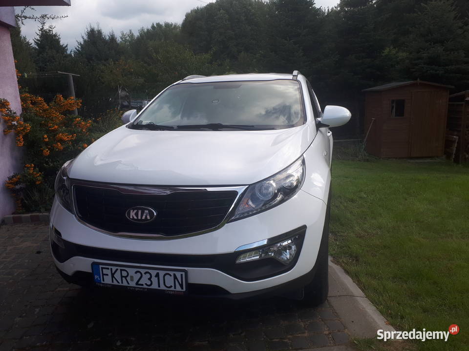 Kia Sportage 16 benzyna Biala perła komplet opon ABS Połupin