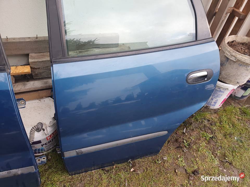 Drzwi tylne prawe lewe Nissan Almera Tino
