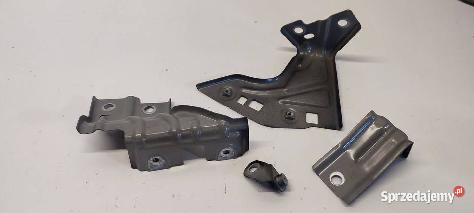 VW TAYRON MOCOWANIE BŁOTNIKA LEWE KOMPLET osobowe