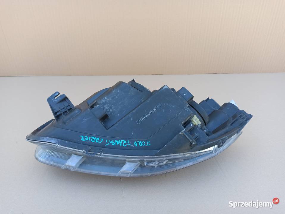 TRANSIT TOURNEO COURIER REFLEKTOR PRAWY LAMPA Trzciel