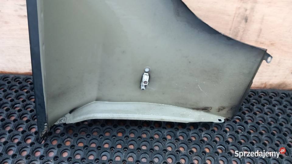 BMW E90 E91 FL BŁOTNIK PRZÓD LEWY 668 Zbierkowo