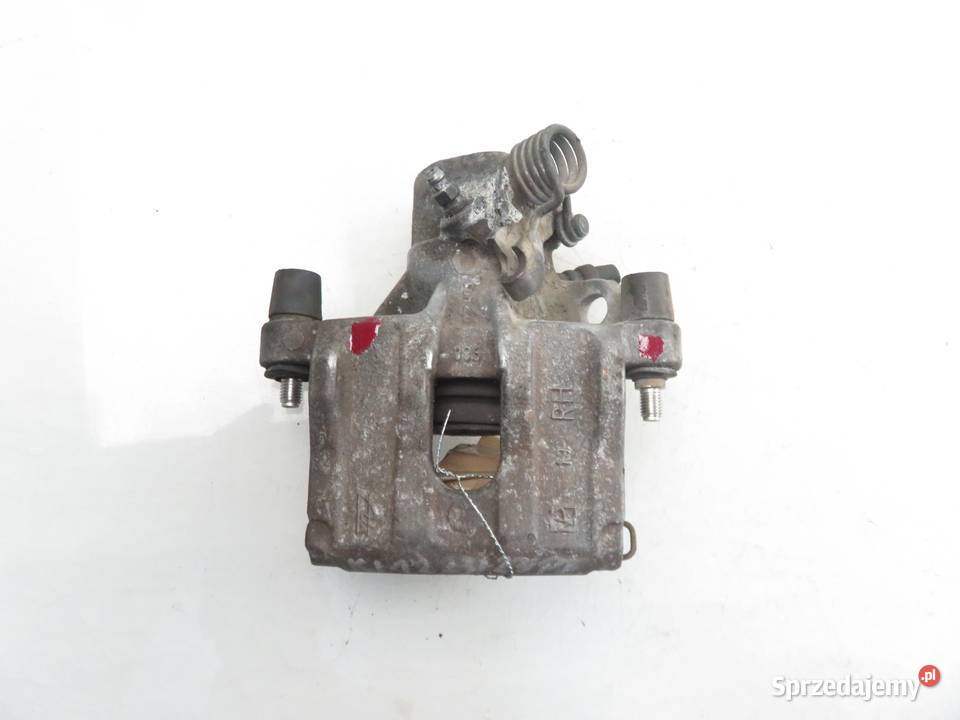 ZACISK PRAWY TYŁ MAZDA 3 sedan