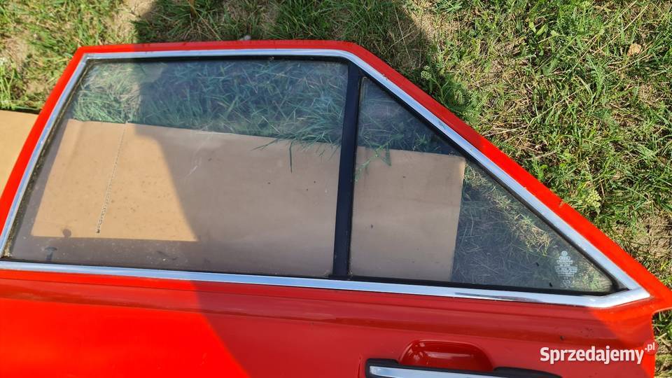 Drzwi lewy tył Audi 80 B1 marsrot L31B Dobrodzień