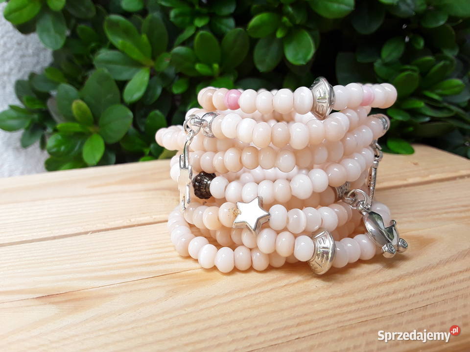 Zestaw 9 bransoletek koralikowych z zawieszkami Warszawa