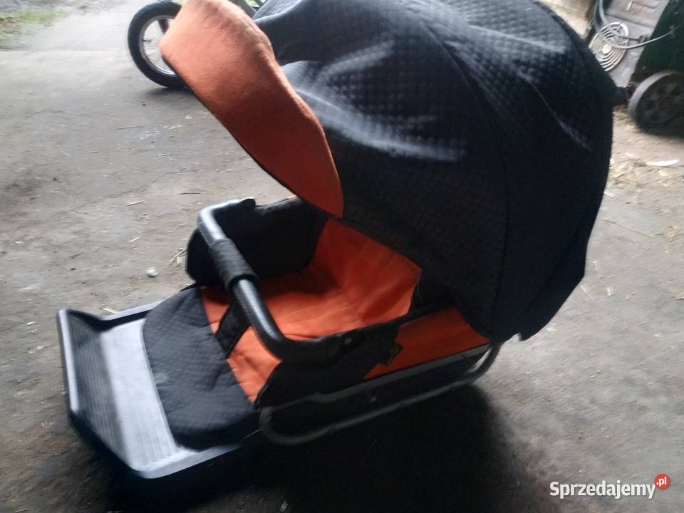 Sprzedam wózek z spacerówką pomarańczowy Łomża