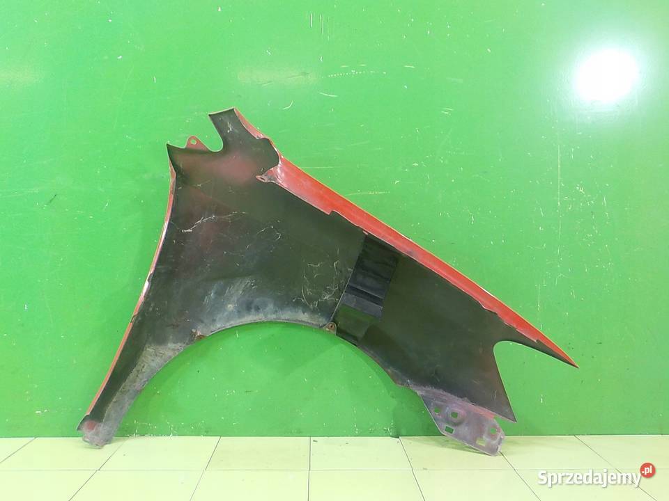 VW POLO V 6R 12 B 11r blotnik lewy przod Błotniki Suków