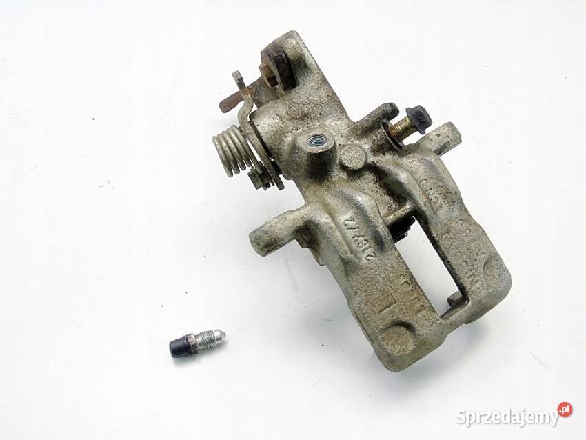 ZACISK HAMULCOWY LEWY TYŁ NISSAN ALMERA TINO śląskie Sosnowiec