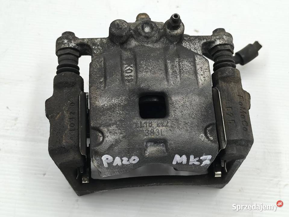 ZACISK LEWY PRZÓD FORD FIESTA MK7 LIFT 10