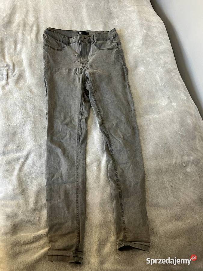 Mid waist skinny jeans spodnie jeansowe rurki szary/srebrny Spodnie Jasło sprzedam