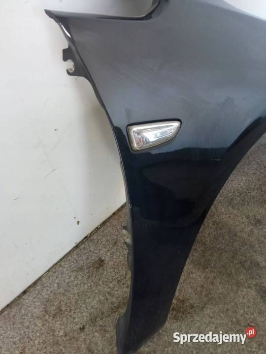 BŁOTNIK PRAWY PRZÓD LIFT Z190 Opel Astra IV 2009