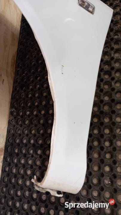 OPEL CORSA D BŁOTNIK PRZÓD LEWY Z40R Zbierkowo
