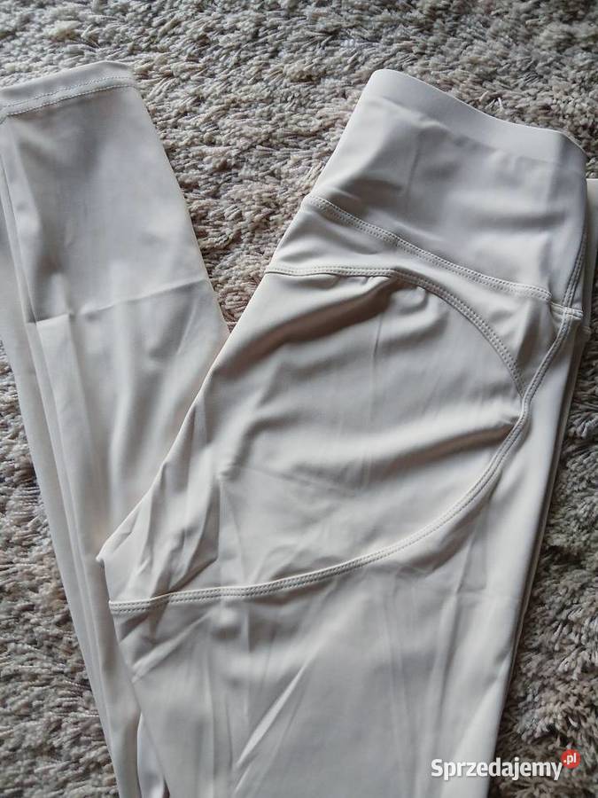 Sportowe leginsy bezowe Lxl Legnica