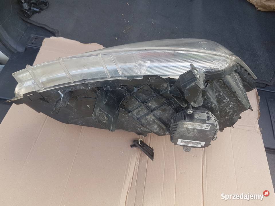 Reflektor Xenon lewy Renault Koleos I 4x4 20 dci Oświetlenie małopolskie Kraków
