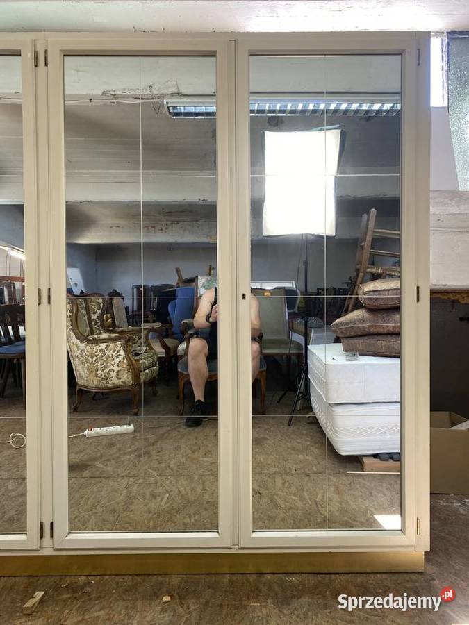 Biała szafa pięciodrzwiowa z lustrami