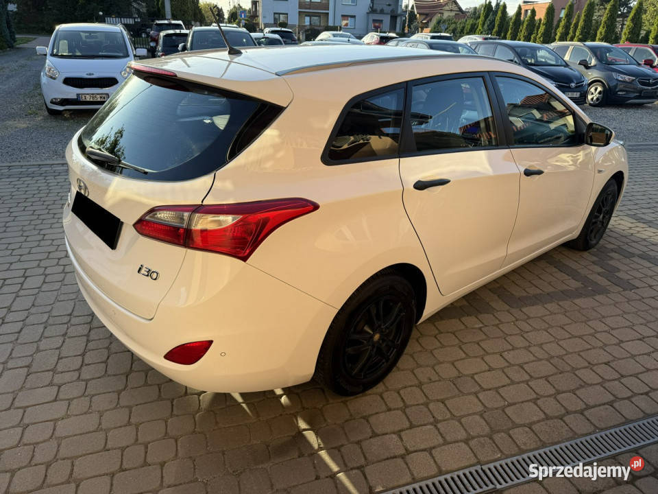 Hyundai i30 Rej012013 14 100 Klimatyzacja II wielofunkcyjna kierownica Orzech sprzedam