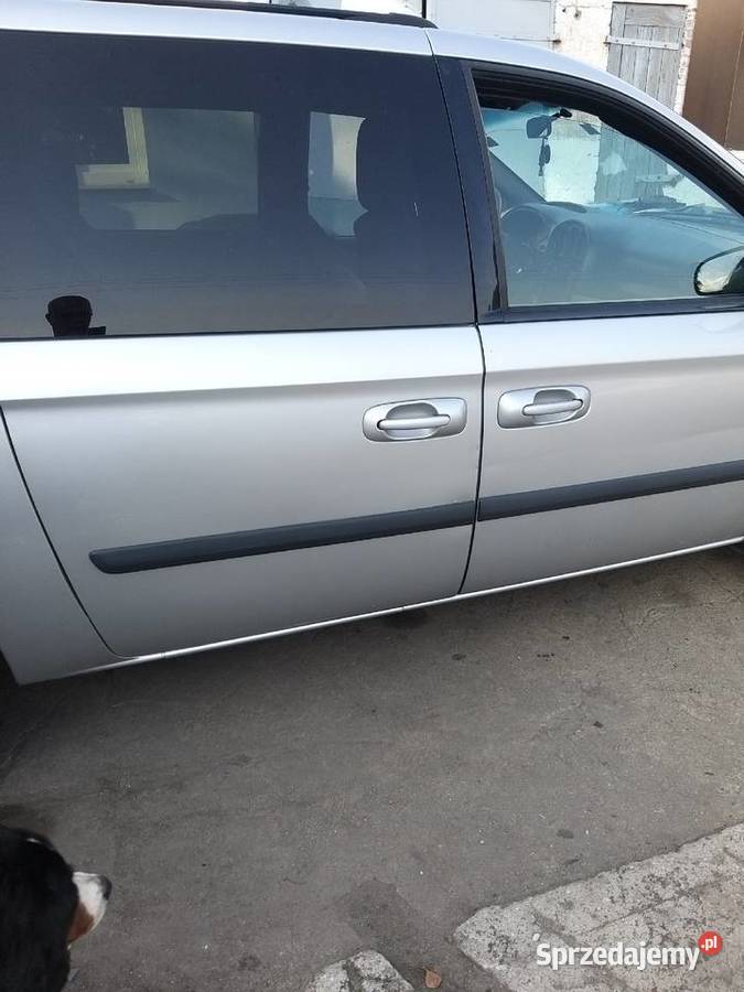 CHRYSLER GRAND VOYAGER DRZWI LEWE SREBRNE 0107 R Kawnice