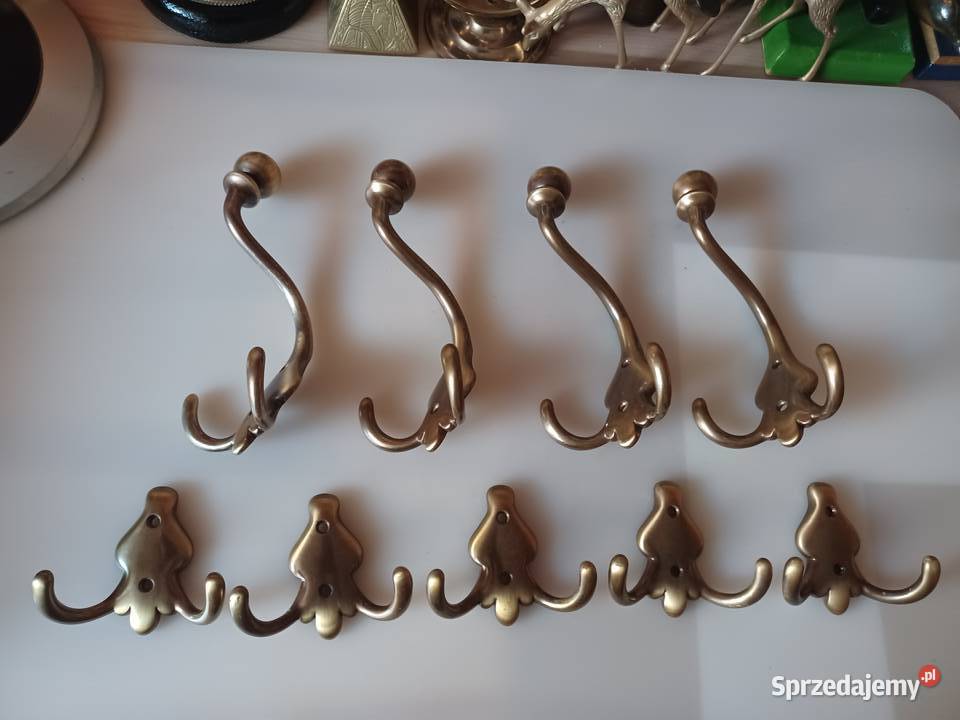 Ładny komplet masywnych wieszaków Mosiądz Poznań