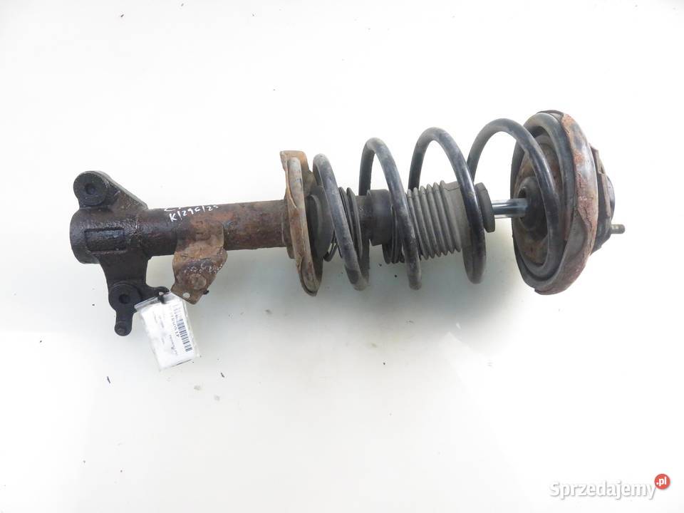 MCPERSON LEWY PRZEDNI NISSAN PRIMERA P12 18 osobowe małopolskie