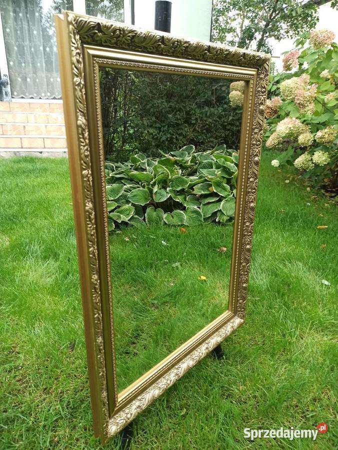 Stylowe lustro w złocone ramie Budzyń