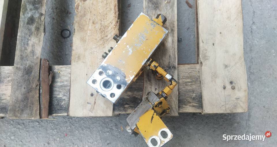 6 WYJŚĆ KOSTKA ZAWÓR ZAMEK HYDRAULICZNY CEWKA Części do maszyn budowlanych Kielce sprzedam