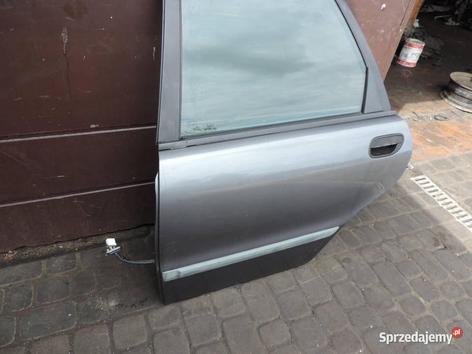VOLVO V40 I FL DRZWI LEWE TYLNE TYŁ 34722 Drzwi Nowy Sącz