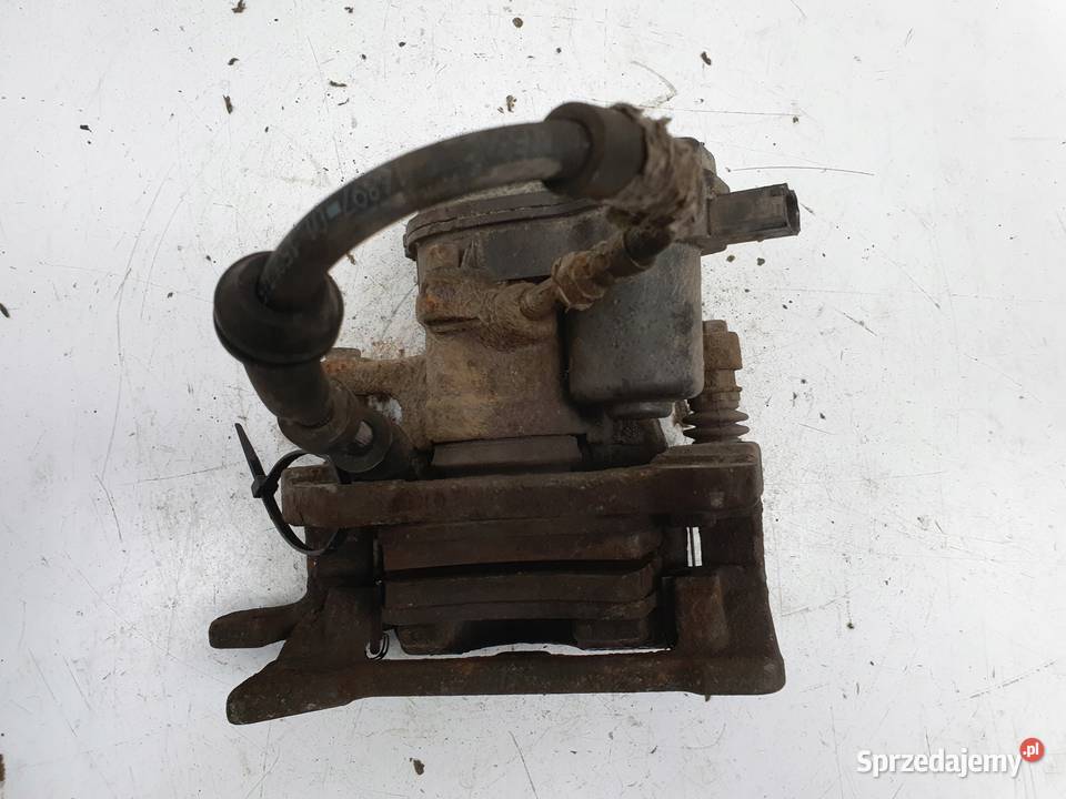 Audi Q5 TYLNY ZACISK HAMULCOWY prawy tył osobowe Janów