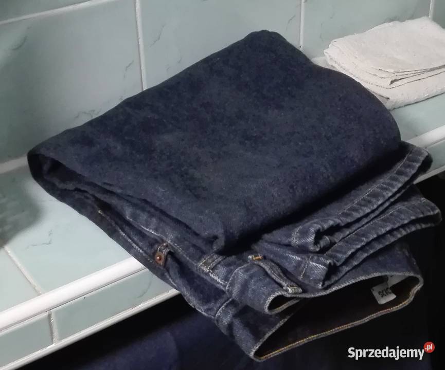 Jeansy długie ciemno granatowe 40 42 L XL Nowe