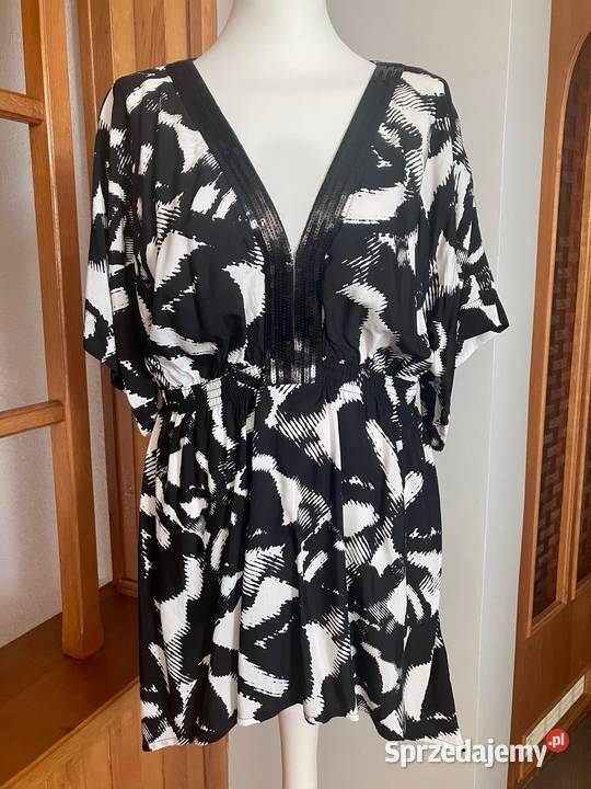 Nowa tunika bluzka czarno biała cekiny HM krótki Nisko
