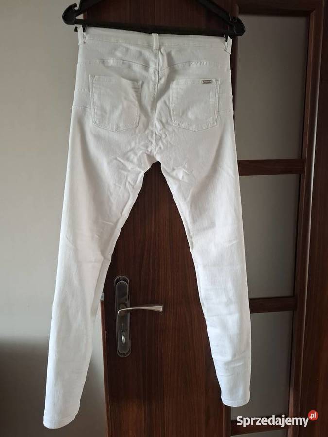 Biale spodnie damskie Poznań