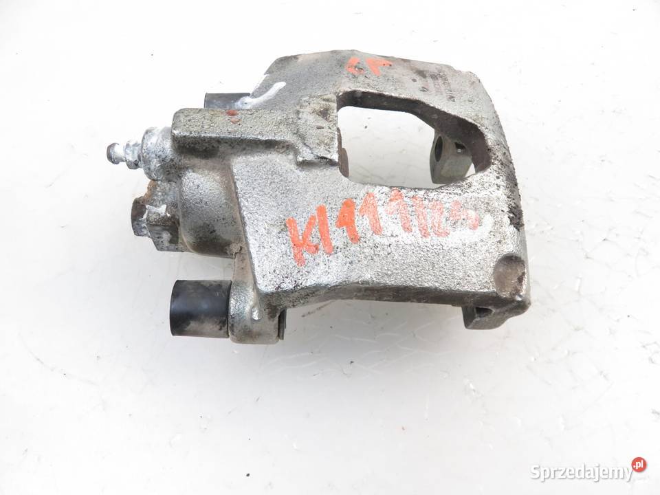 ZACISK LEWY PRZÓD CHRYSLER VOYAGER IV 25 CRD