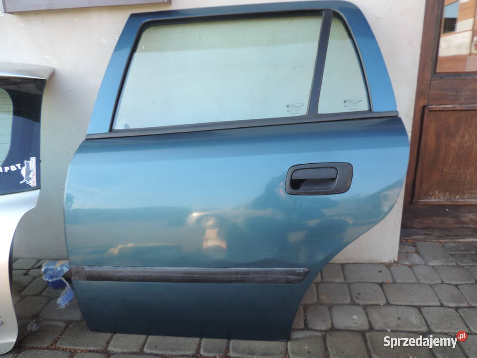 Drzwi lewy tył Astra 2 kolor Z20M kombi części blacharskie