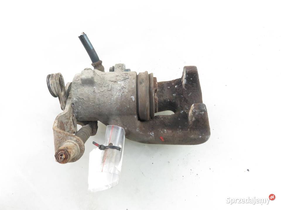 ZACISK LEWY TYŁ OPEL ZAFIRA B 19 CDTI