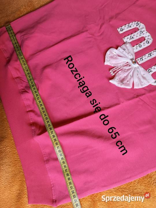 Bluza różowa z ozdobną kokardą i perełkami Rozmiar 44(XXL) Cieszyn