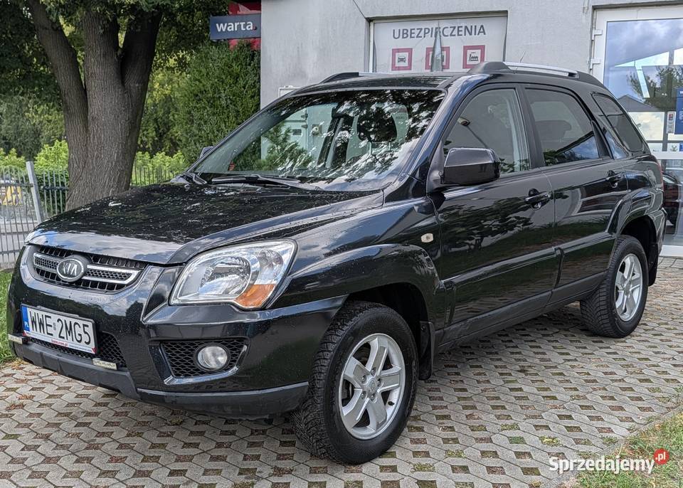 Kia Sportage 20 z LPG relingi dachowe Ozorków