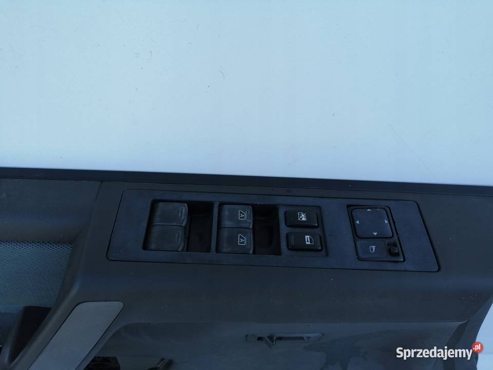 TAPICERKA BOCZEK DRZWI LEWY PRZÓD NISSAN TITAN osobowe wielkopolskie Nowy Tomyśl
