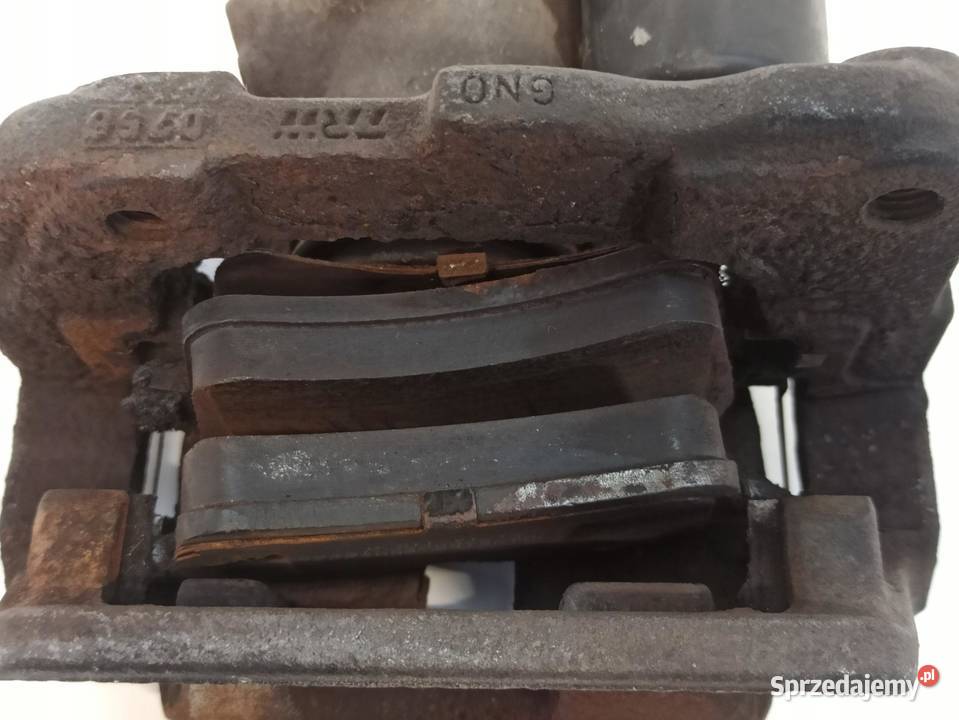 AUDI A8 D4 ZACISK HAMULCOWY PRAWY TYŁ 4H0615404