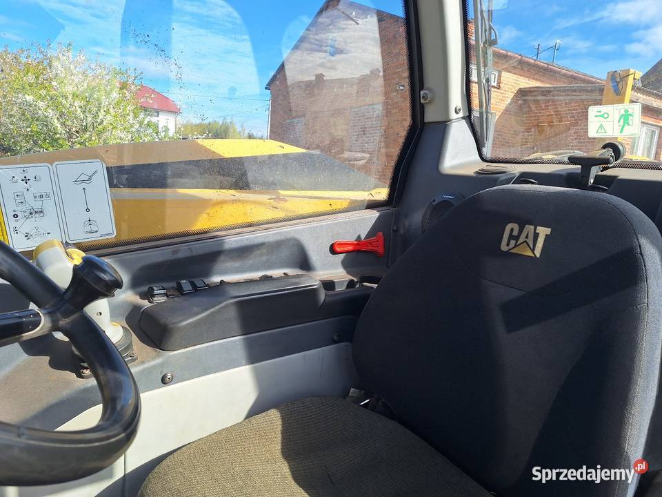 Ladowarka teleskopowa Caterpillar TH407C 2015 Pneumatyczne siedzenie Caterpillar Parczew