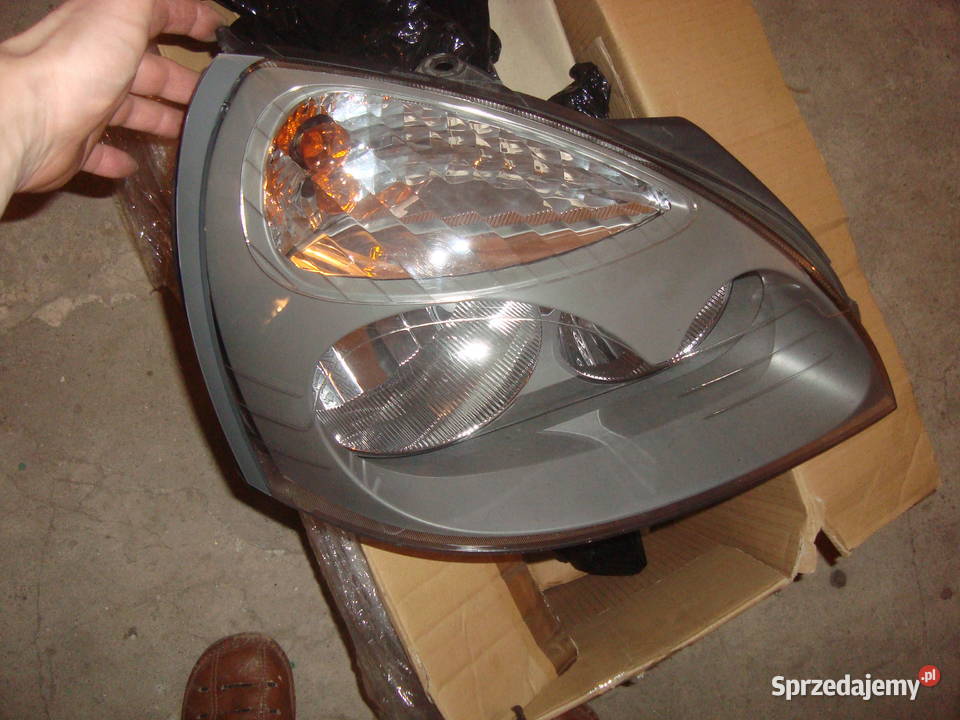 reflektor lampa prawa przednia przód renault Oświetlenie śląskie Tarnowskie Góry