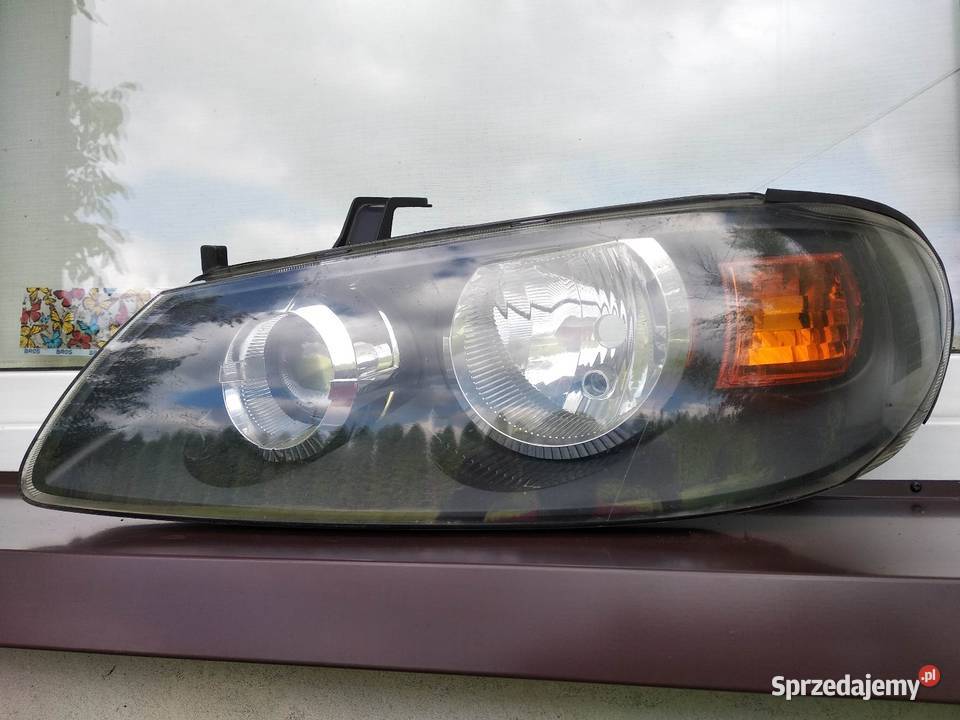 Nissan Almera N16 LIFT FL lampa przednia lewa Sieradz