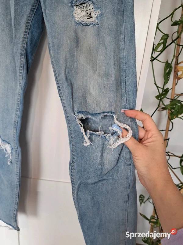 Jeansy z dziurami z Terranova modny casual S Spodnie Trąbki Wielkie