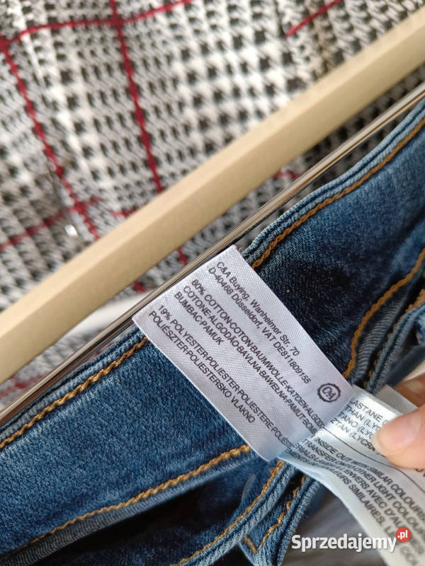 Ciemnoniebieskie ładnie przetarte jeansy CA r Dąbrowica