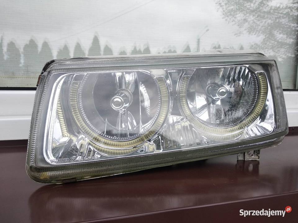 VW Passat B4 lampy przednie prawa lewa komplet Oświetlenie Sieradz