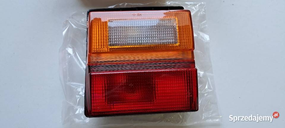 Lampa tylna prawa w klapę Audi 100 C3 LUCID NOWA Luzino