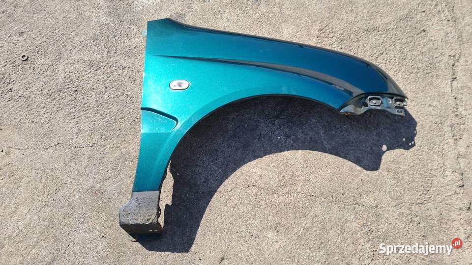 Subaru G3X Justy Suzuki Ignis MH błotnik przedni osobowe Błotniki Legnica