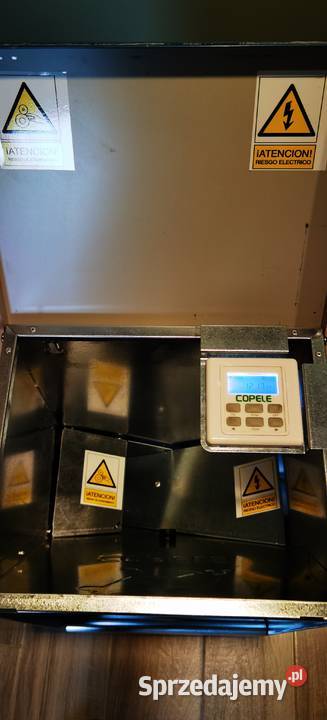 Elektryczny zegarowy karmnik psów Żory